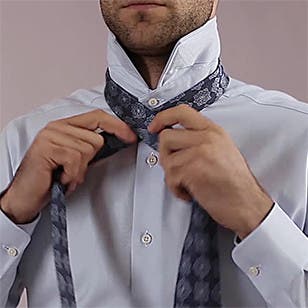 How to tie a half-Windsor knot.