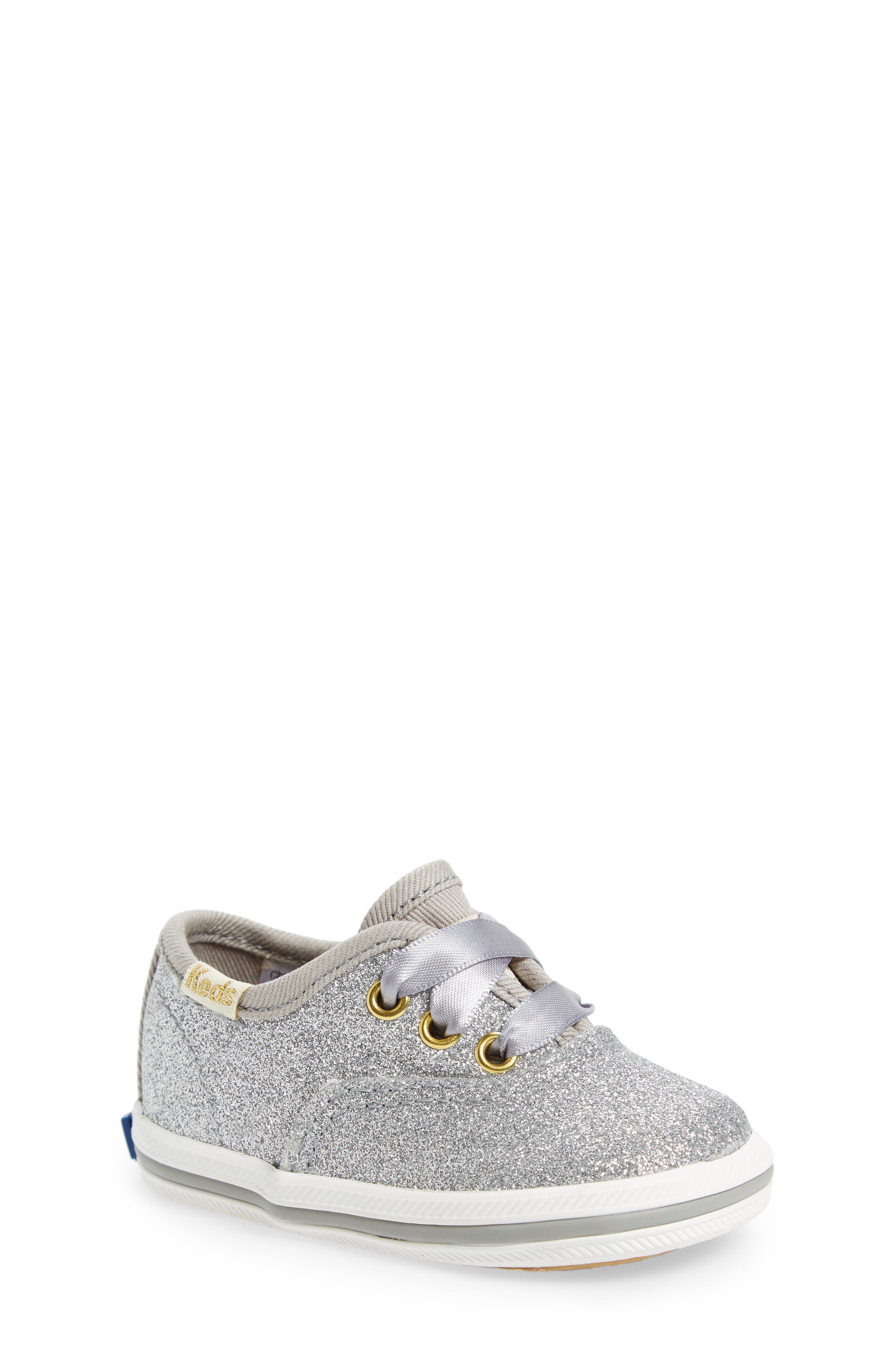 UPC 884401127210 product image for Infant Girl's Keds X Kate Spade New York Champion Glitter Crib Shoe, Size 1 M -  | upcitemdb.com