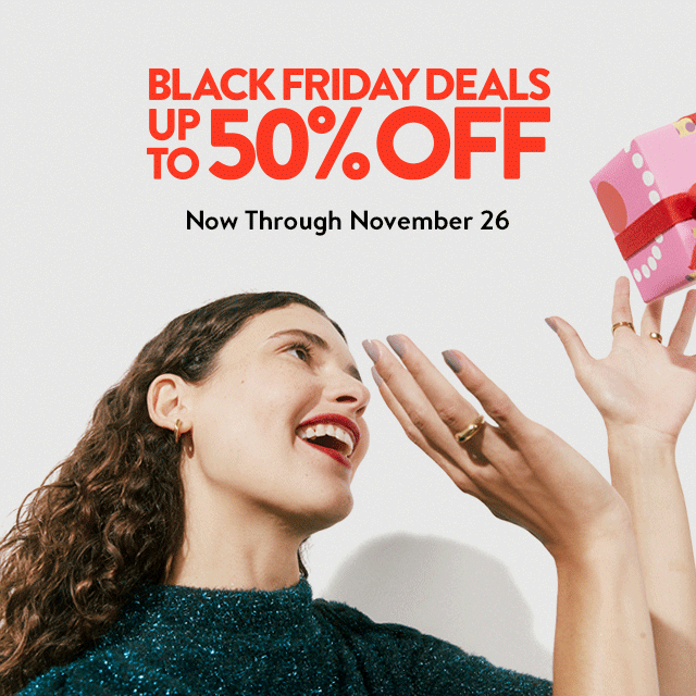 Black Friday deals up to 50% off. Gift boxes in the air.