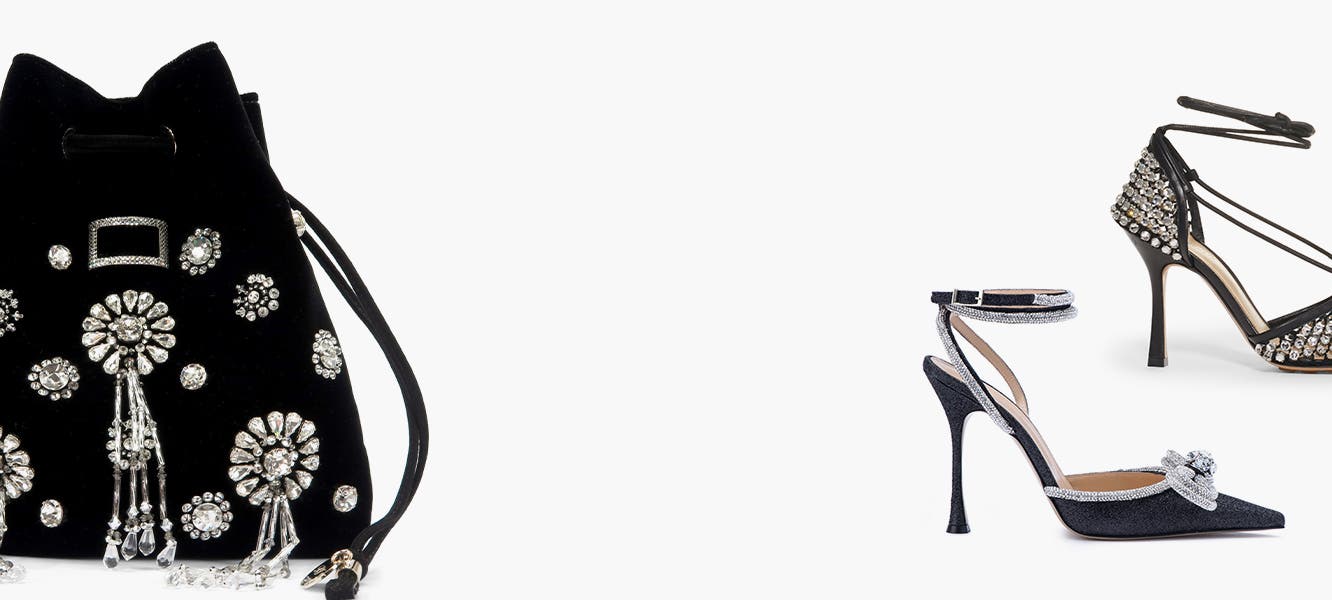 The designer edit: model in a little black dress, plus shoes and a handbag.