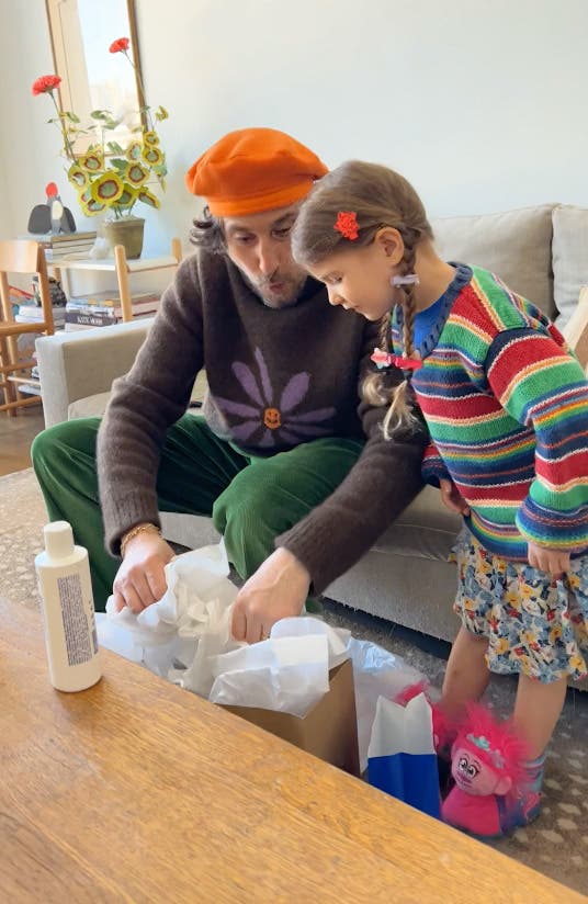 Mordechai Rubinstein and his daughter celebrate Father's Day at home.