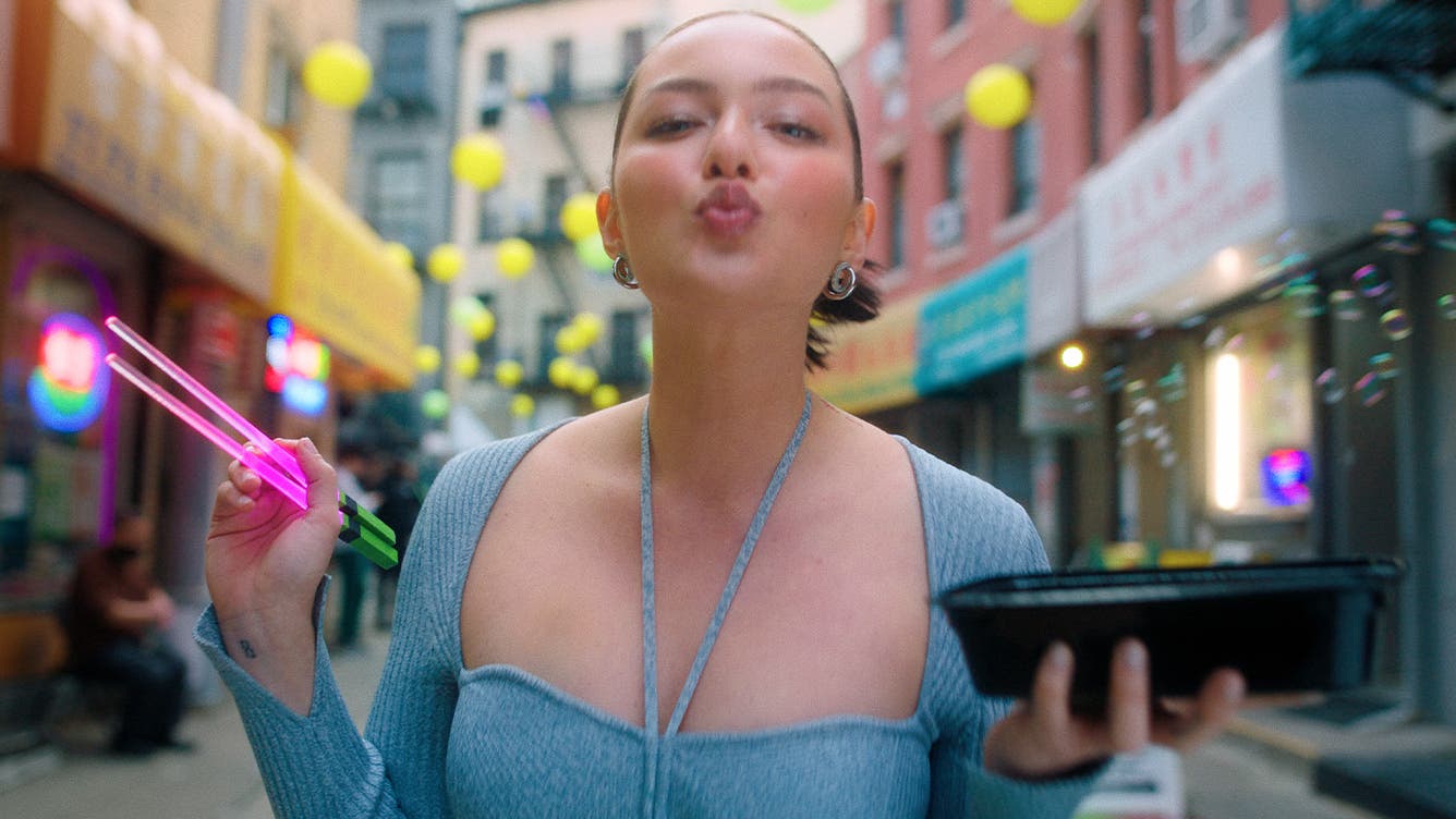 Play a video of model Mia Kang sharing how she spends her day and what she wears.