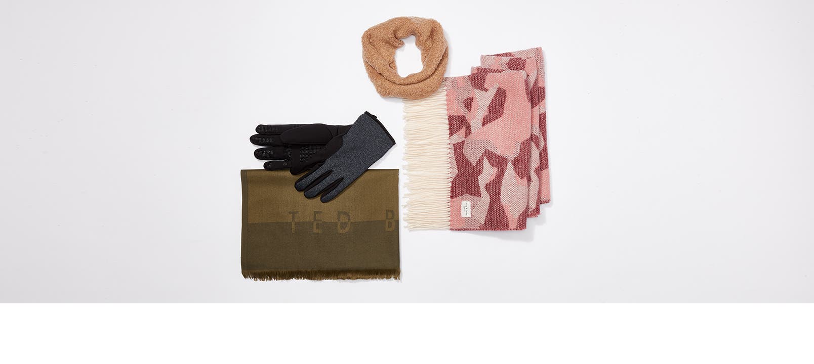 An assortment of gloves and scarves on a white background.