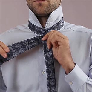 How to tie a half-Windsor knot.