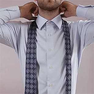 How to tie a half-Windsor knot.