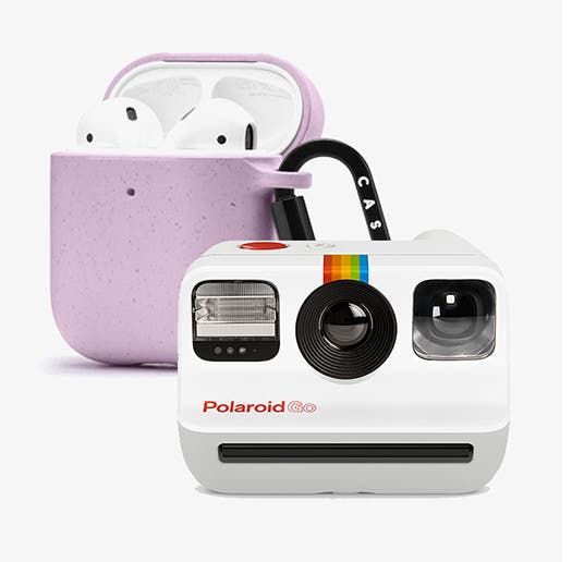 A white Polaroid instant camera; a lavender compostable AirPods case.