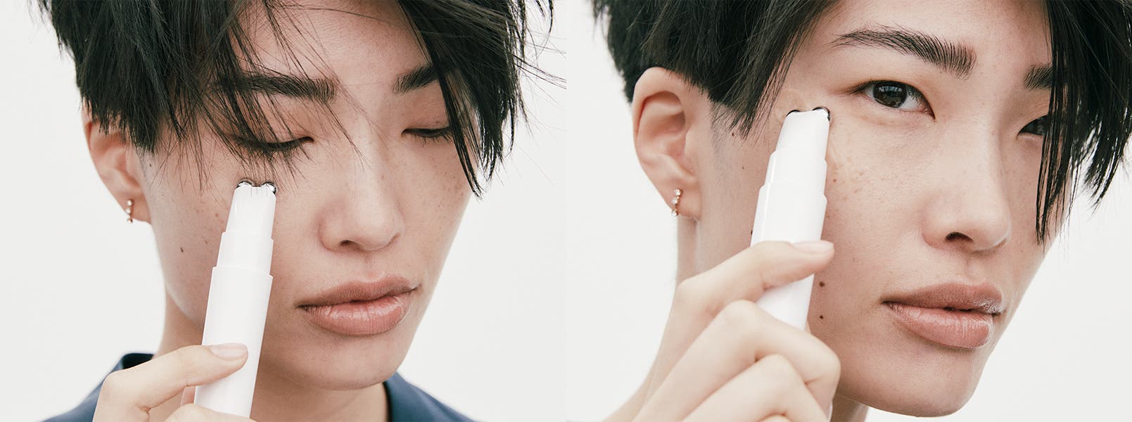 A person uses a facial tool.
