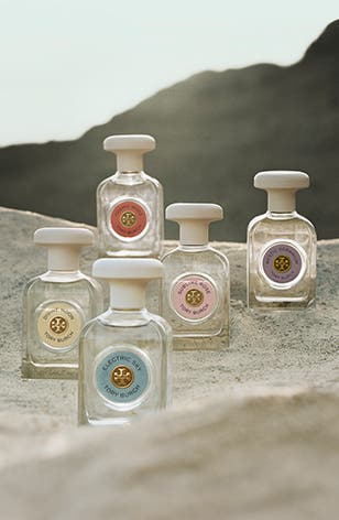 Five bottles from the Essence of Dreams fragrance collection.