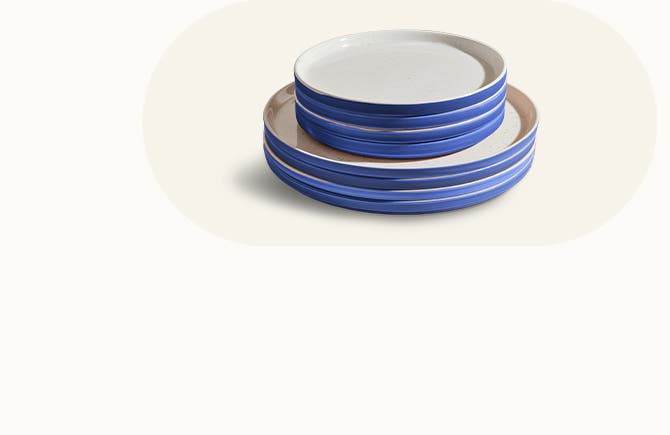 Blue and white dinner plates and side plates.