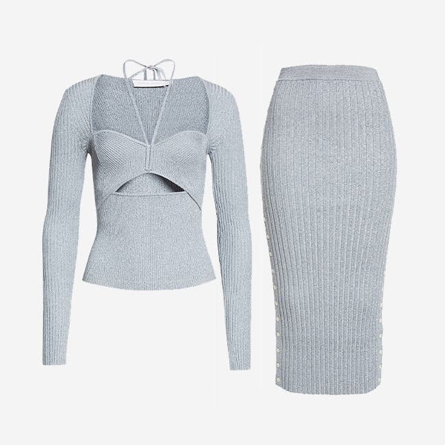 A matching light grey-blue long-sleeve knit top and knit ribbed midi skirt.