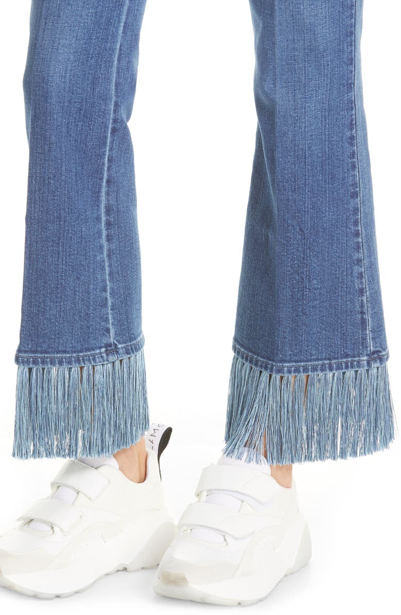 Stella Mccartney Fringe Hem Kick Flare Jeans In Pale Blue