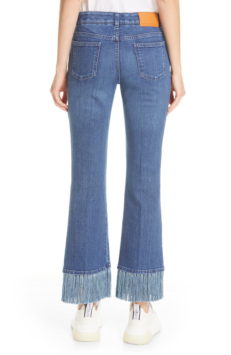 Stella Mccartney Fringe Hem Kick Flare Jeans In Pale Blue