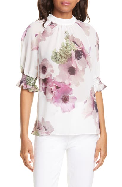 Click to view more detailed imagery on our partner's website Ted Baker Neopolitan Floral Puff Sleeve Top In Ivory