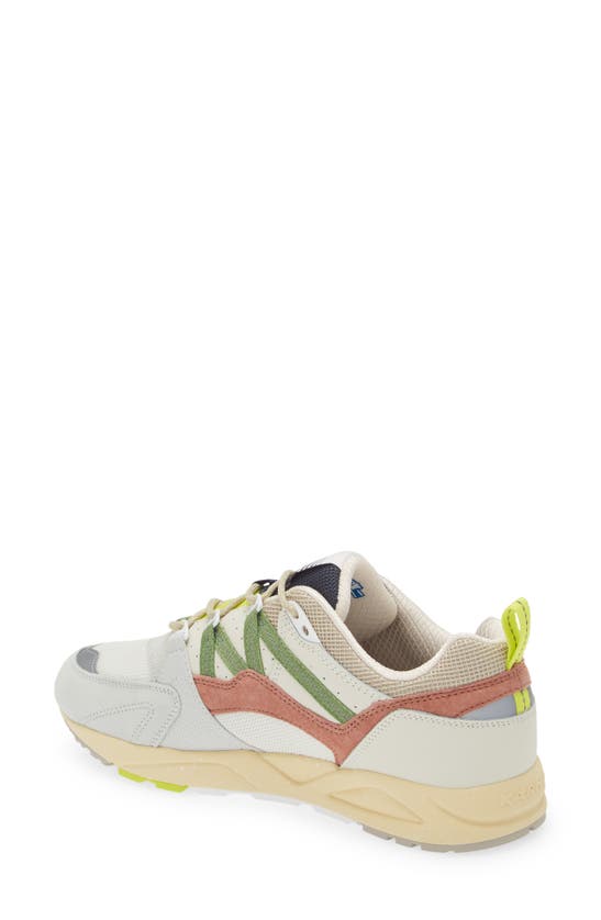 Shop Karhu Gender Inclusive Fusion 2.0 Sneaker In Lily White/ Piquant Green