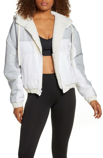 Click to view more detailed imagery on our partner's website Alo Yoga Duality Reversible Faux Shearling Jacket In Pristine/ White/ Dove Grey