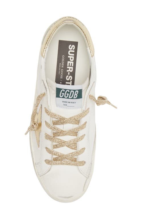 Shop Golden Goose Super-star Low Top Sneaker In White/gold