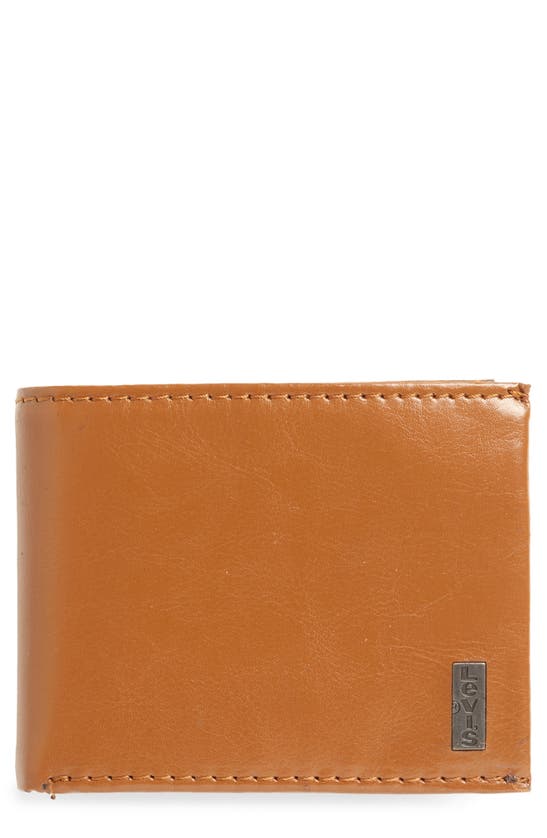 Shop Levi's® Cappadocia Traveler Wallet In Tan