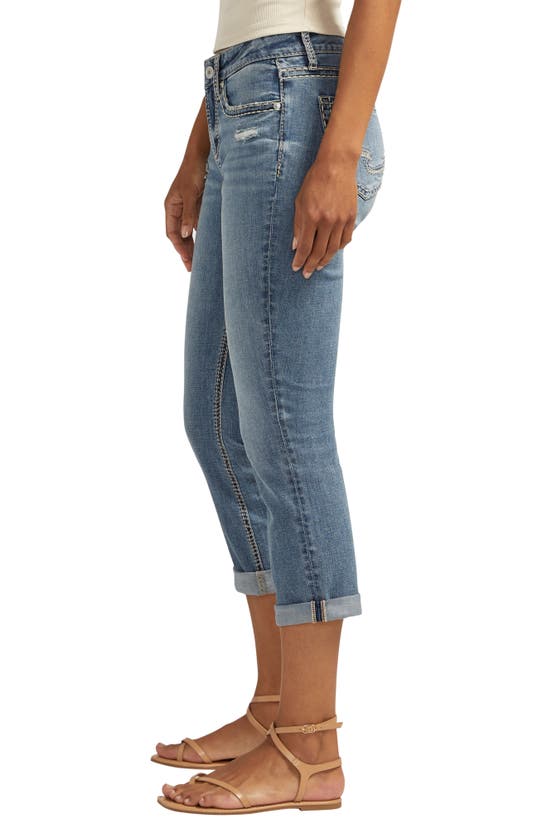Shop Silver Jeans Co. Suki Curvy Fit Ripped Mid Rise Capri Jeans In Indigo