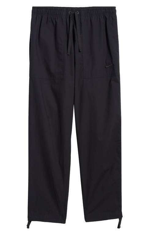 Shop Nike Sportswear Club Barcelona Woven Cotton Pants In Black/black