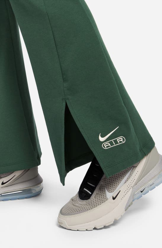 Shop Nike Air High Waist Flare Leggings In Fir/ Pale Ivory