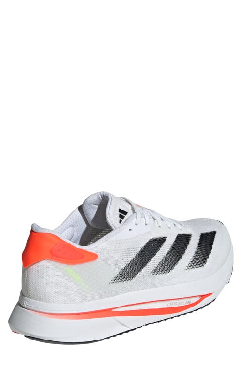 Shop Adidas Originals Adidas Adizero Sl2 Running Shoe In White/black/orange