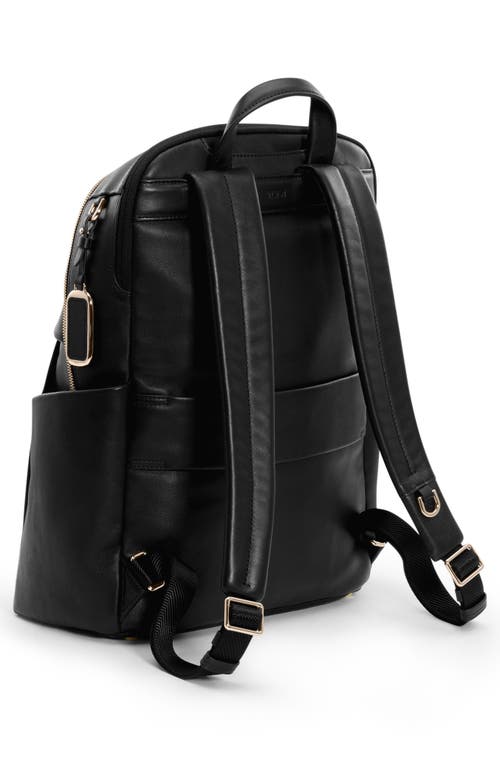 Shop Tumi Raina Leather Backpack In Black/light Gold