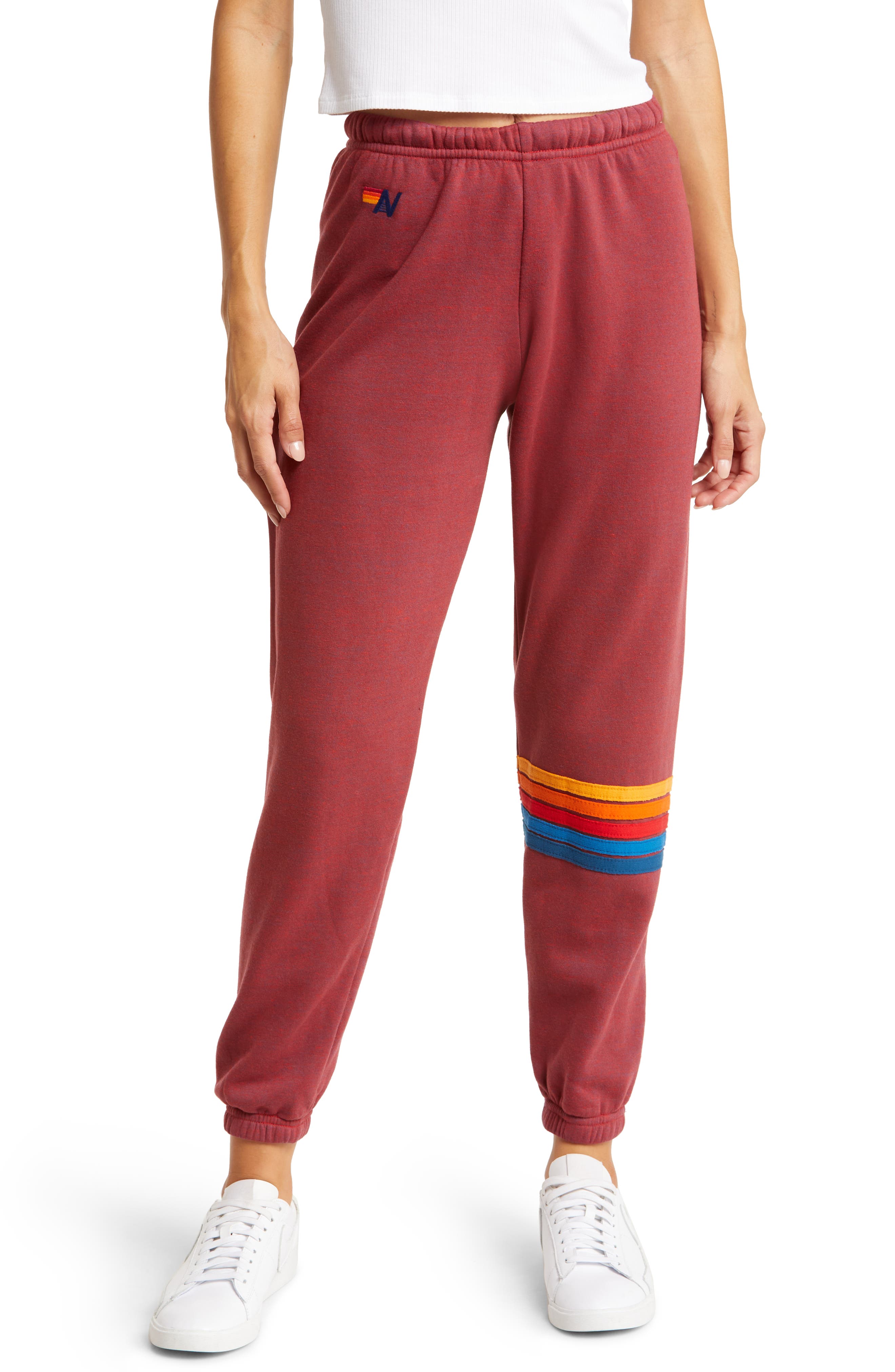 nike athletic sweatpants with rainbow stripe