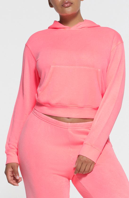 Shop Skims Light French Terry Hoodie In Coral