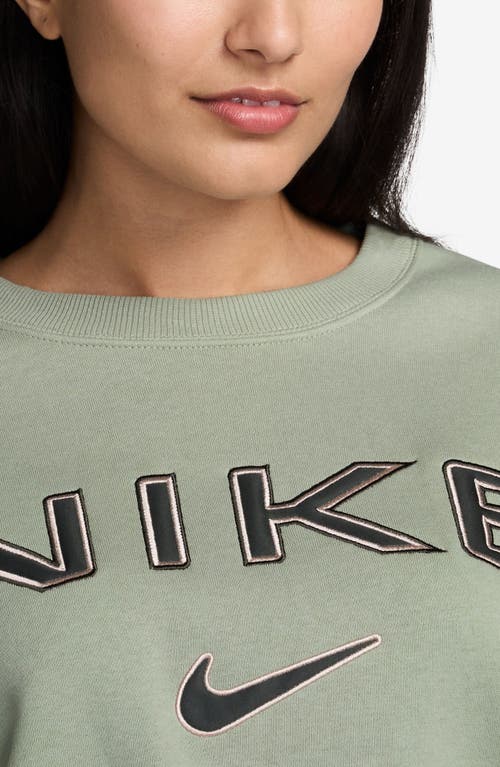 Shop Nike Phoenix Oversize Logo Fleece Sweatshirt In Jade Horizon/lt Orewood Brown