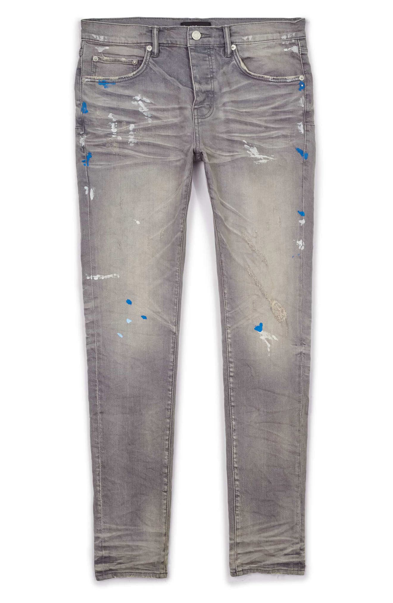 grey ripped jeans paint splatter