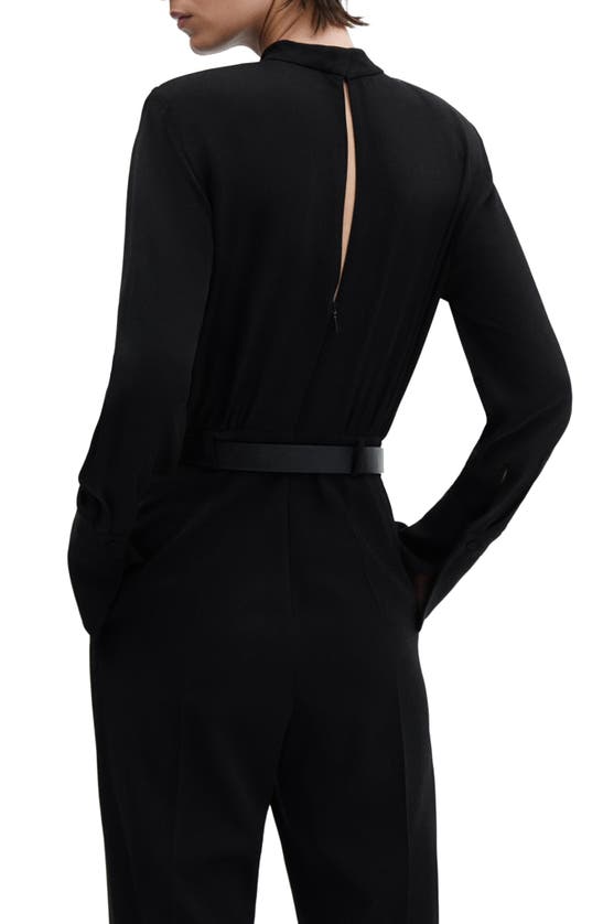 Shop Mango Belted Long Sleeve Jumpsuit In Black