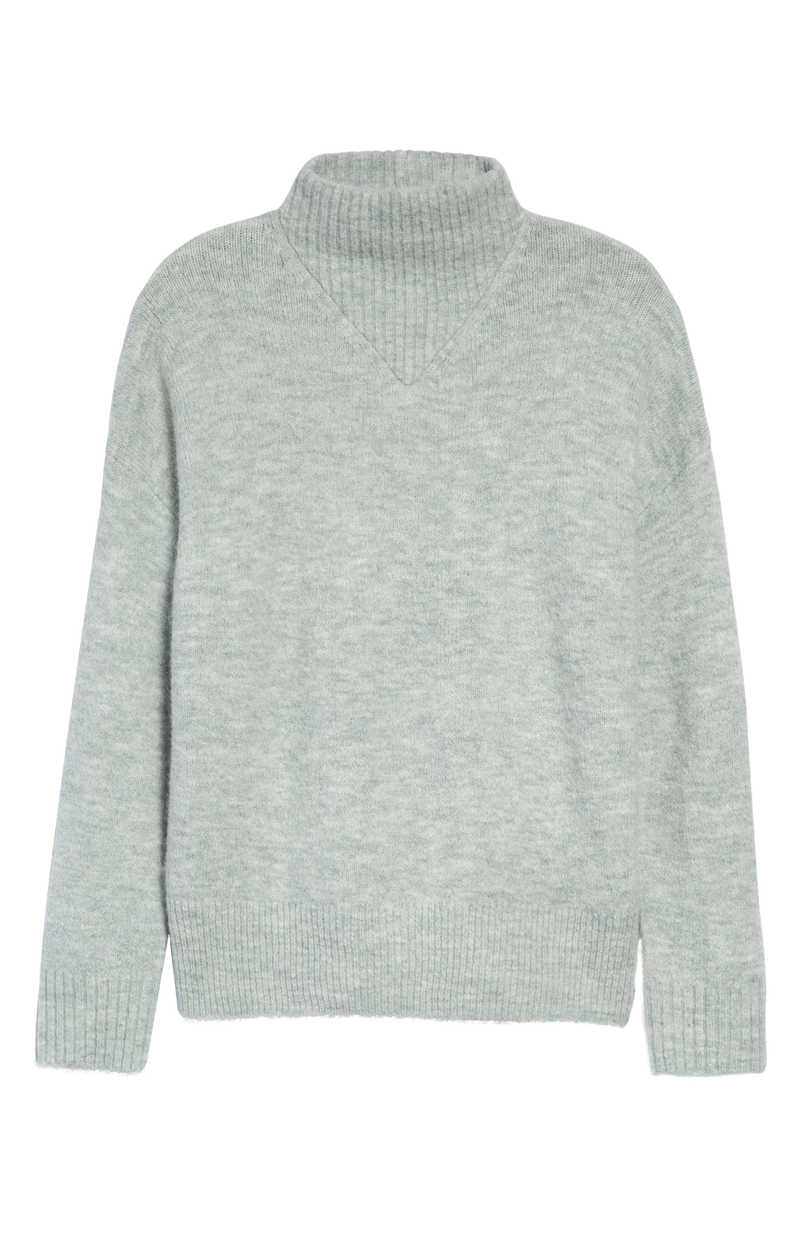 mint green turtleneck sweater