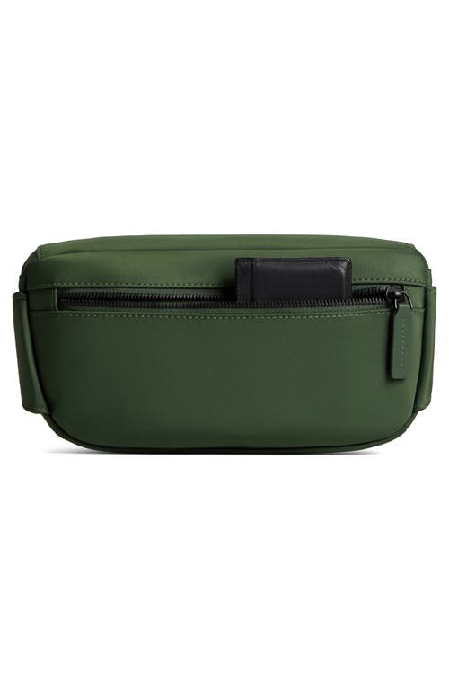 Shop Monos Metro Sling Bag In Juniper Green