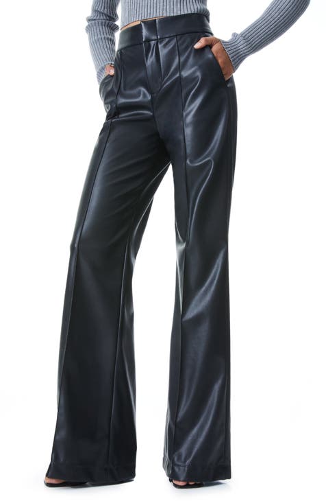 Love those high waisted belted tie black leather pants with trendy