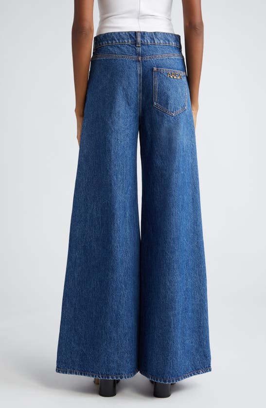 Shop Area Crystal Eyelet Wide Leg Jeans In Dark Medium Wash