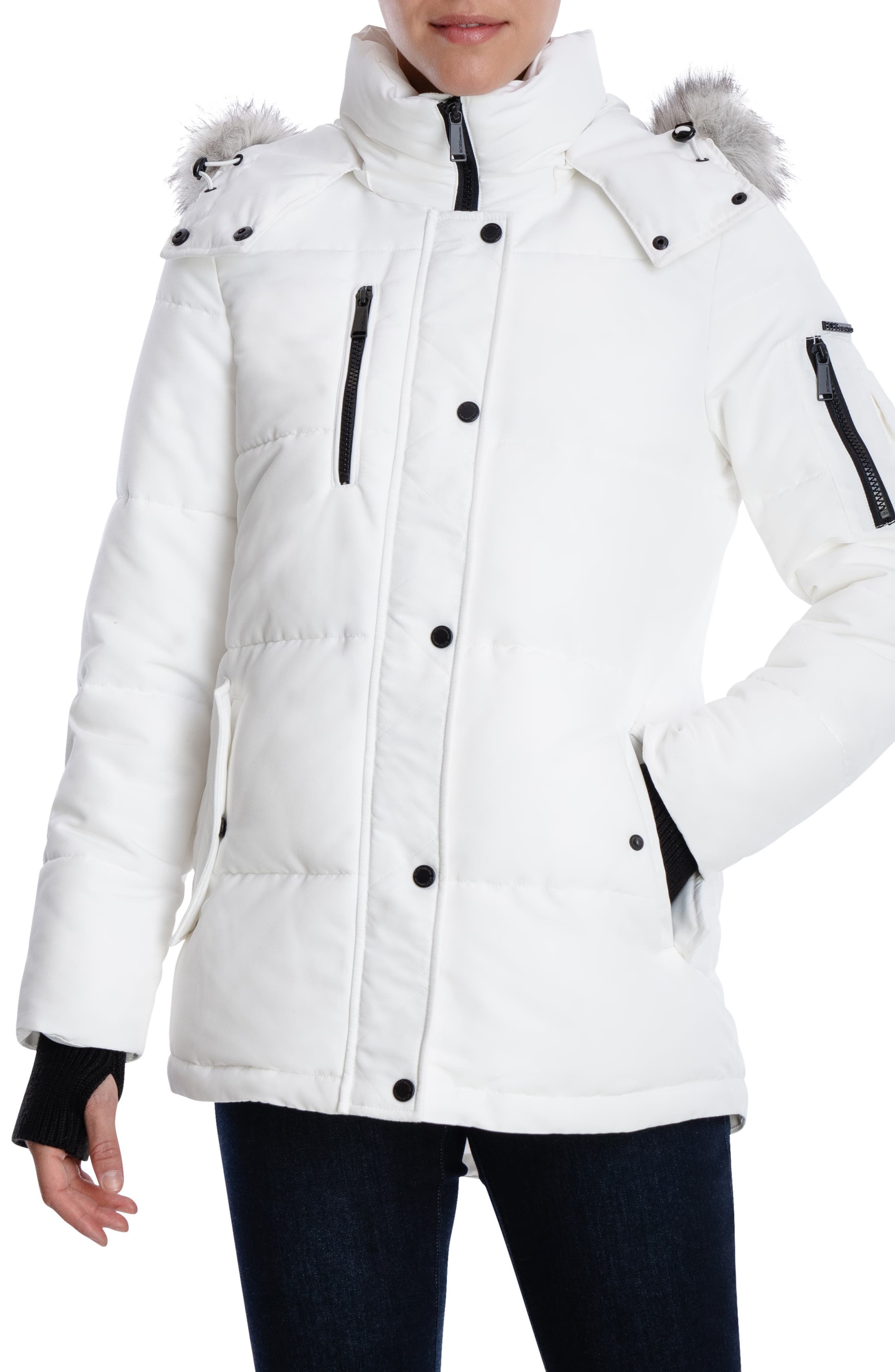white puffer jacket with black fur hood