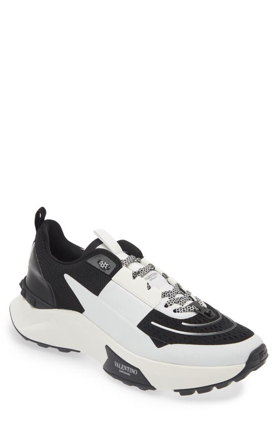 Shop Valentino Garavani Rockstud Knit Sneaker In Nero-bianco