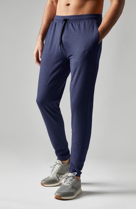 Shop Rhone Ooo Tapered Knit Pants In Navy