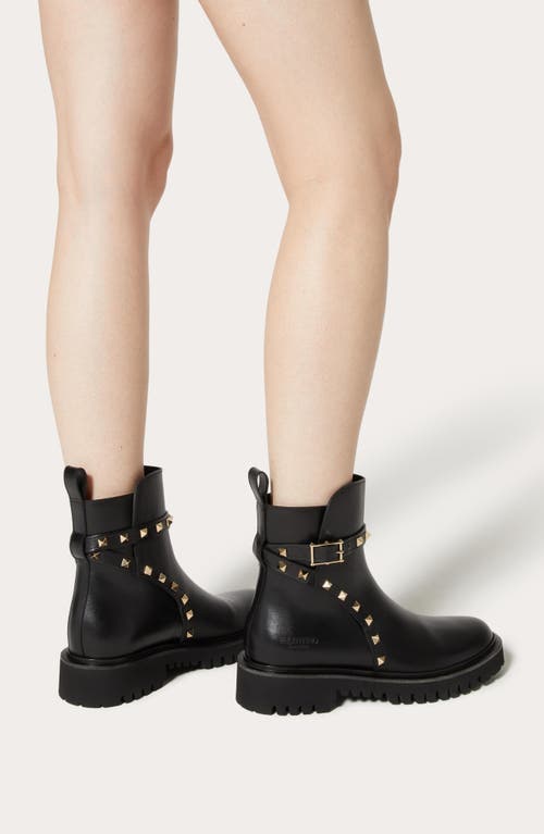 Shop Valentino Garavani Rockstud Combat Boot In Nero/gold