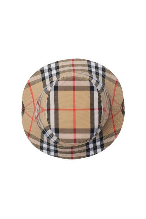 Shop Burberry Reversible Cotton Bucket Hat In Sand