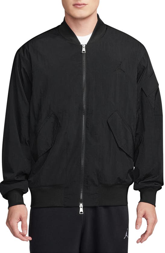 Shop Jordan Essentials Lightweight Nylon Renegade Jacket In Black