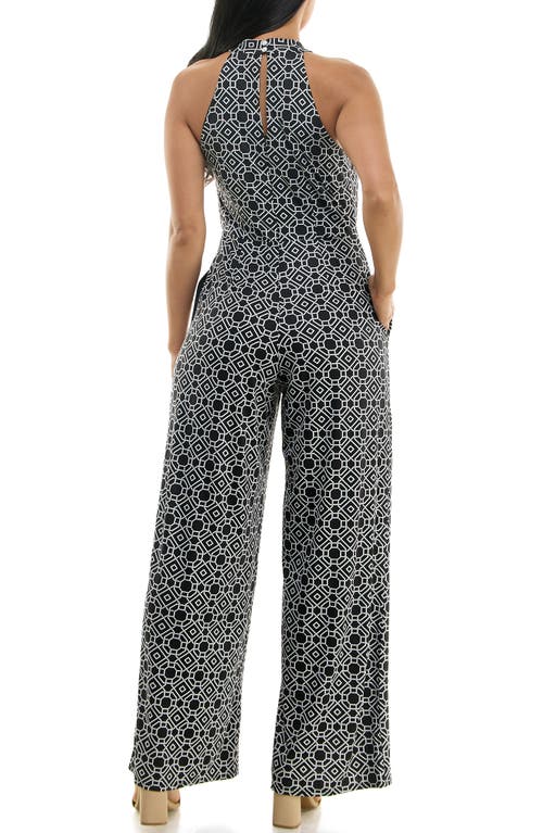 Shop Nina Leonard Twisted Halter Neck Jumpsuit In Black/white