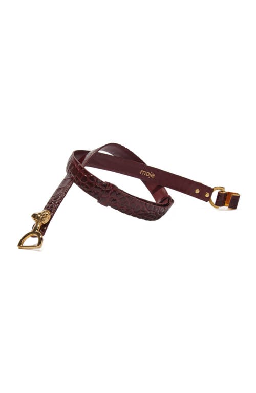 Shop Maje Thin Leather Belt With Lion Bit In Burgundy