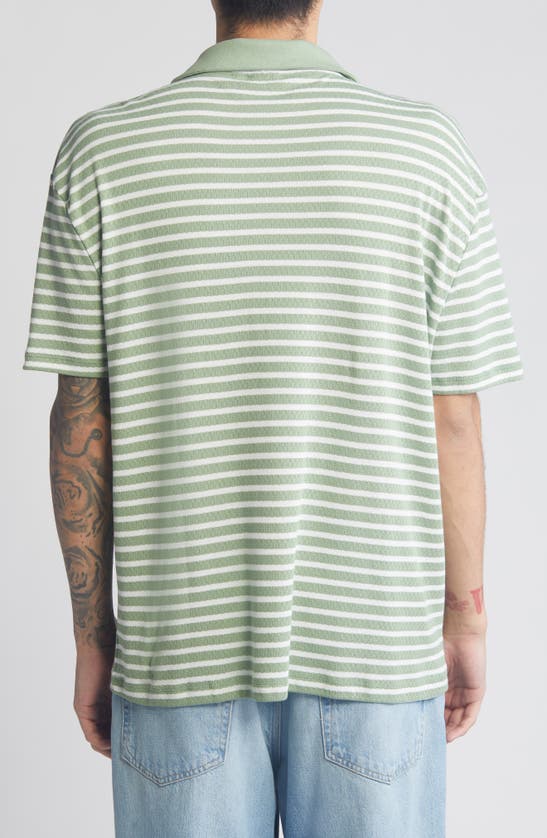 Shop Asos Design Stripe Relaxed Johnny Collar Polo In Mid Green