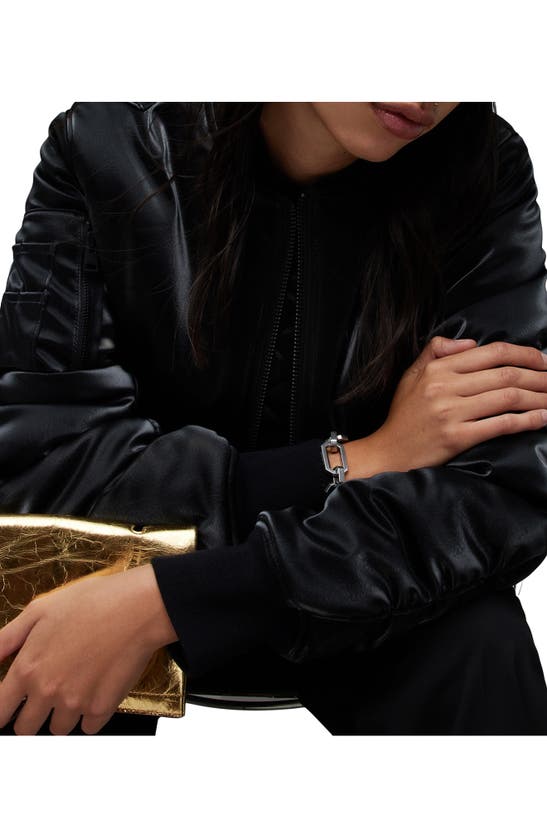 Allsaints Yua Leather Clutch In Gold