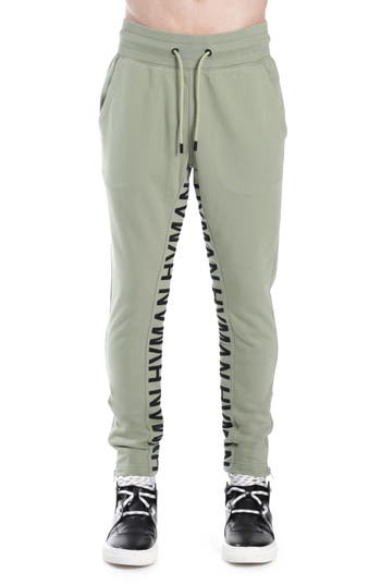 Shop Hvman Logo Knit Track Pants In Green