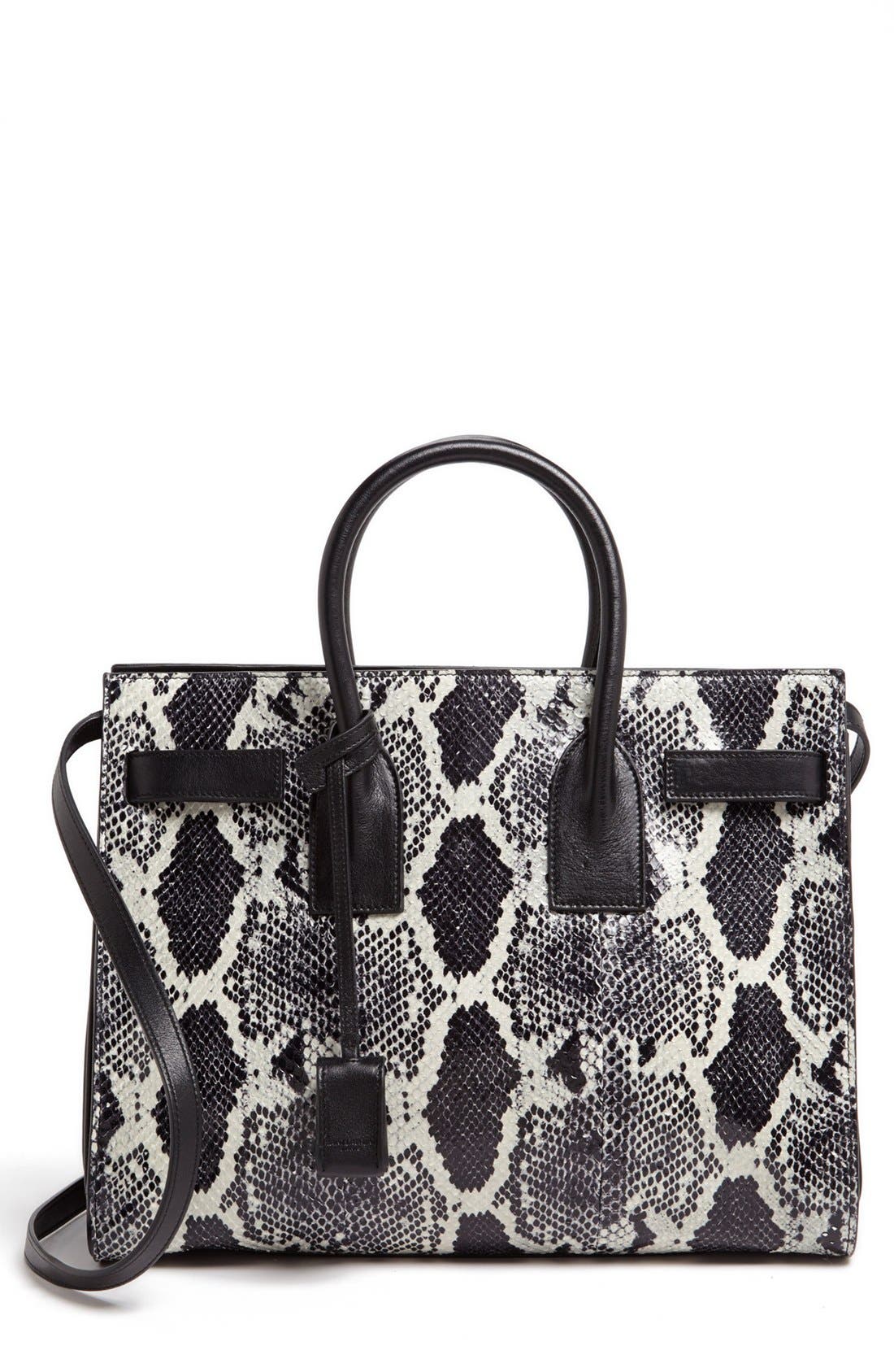 YSLのパイソンシガレットバッグ CASSANDRE large envelope clutch in python | Saint Laurent