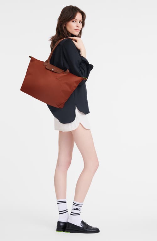 Shop Longchamp Large Le Pliage Tote In Chesnut