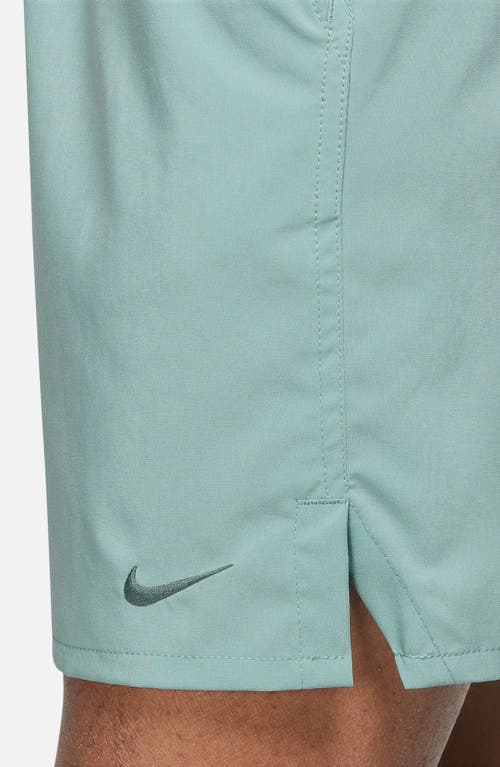 Shop Nike Dri-fit Unlimited 7-inch Unlined Athletic Shorts In Mineral/mineral/mineral