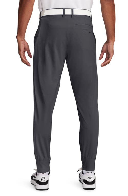 Shop Nike Golf Dri-fit Tour Repel Water Repellent Jogger Golf Pants In Dark Smoke Grey/black